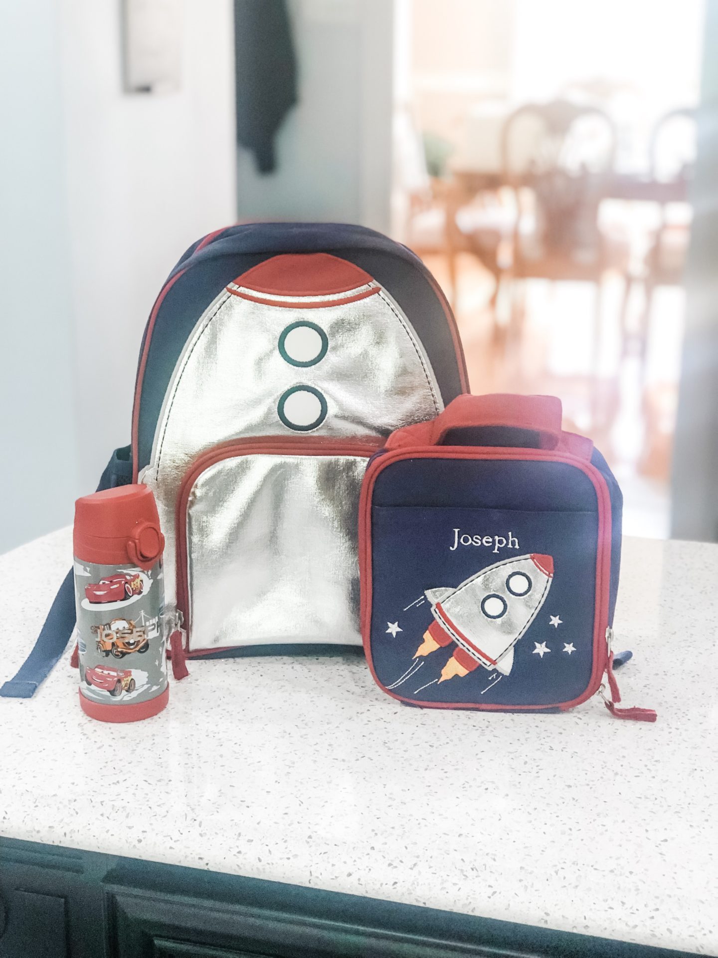 tumbler, backpack, and lunch bag for back to school essentials
