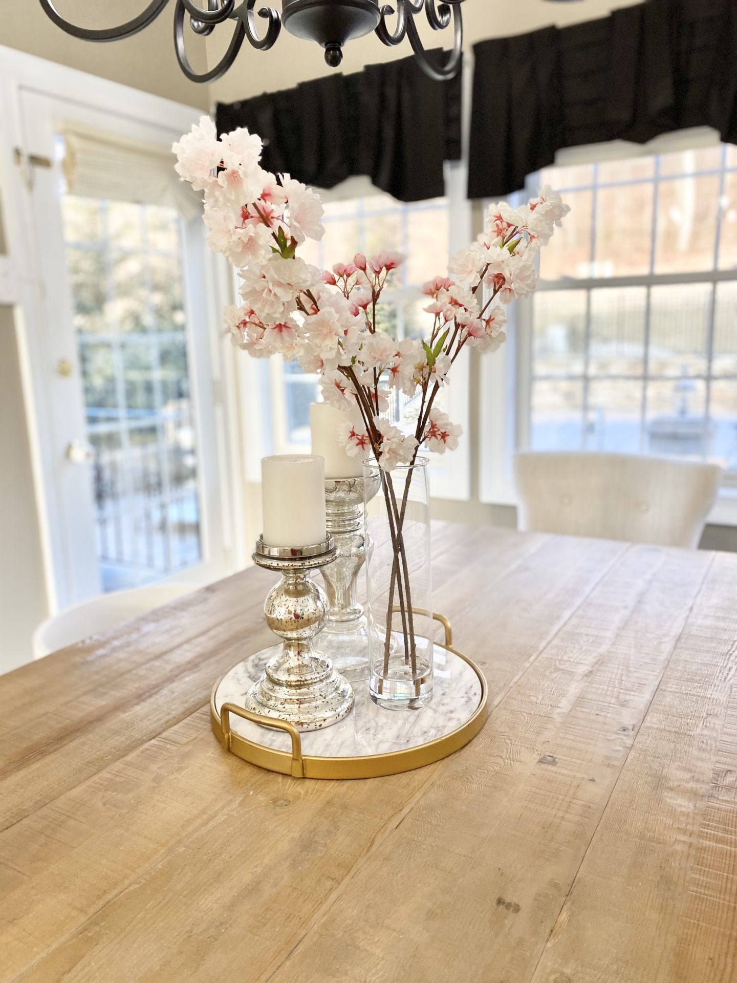 Spring and Easter Home Decor flowers on a wooden table 