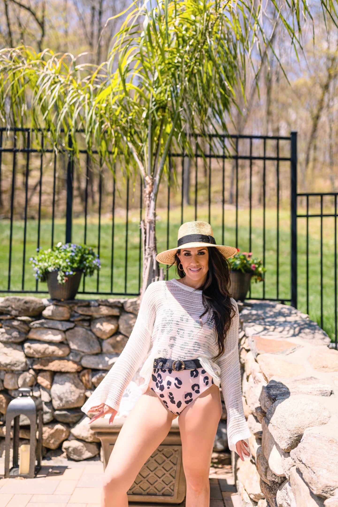 woman wearing beach outfit and sharing Beach Must Haves