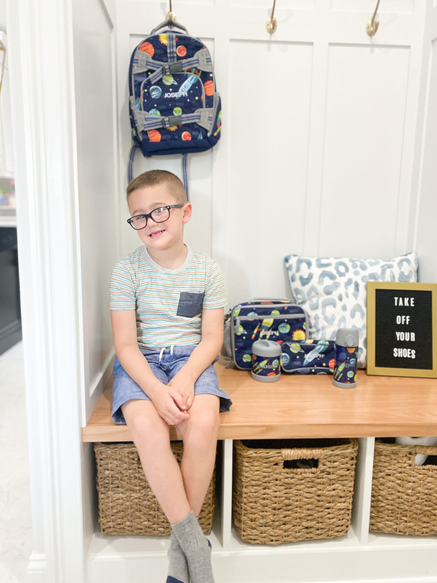 kid with his Back to School Ready items