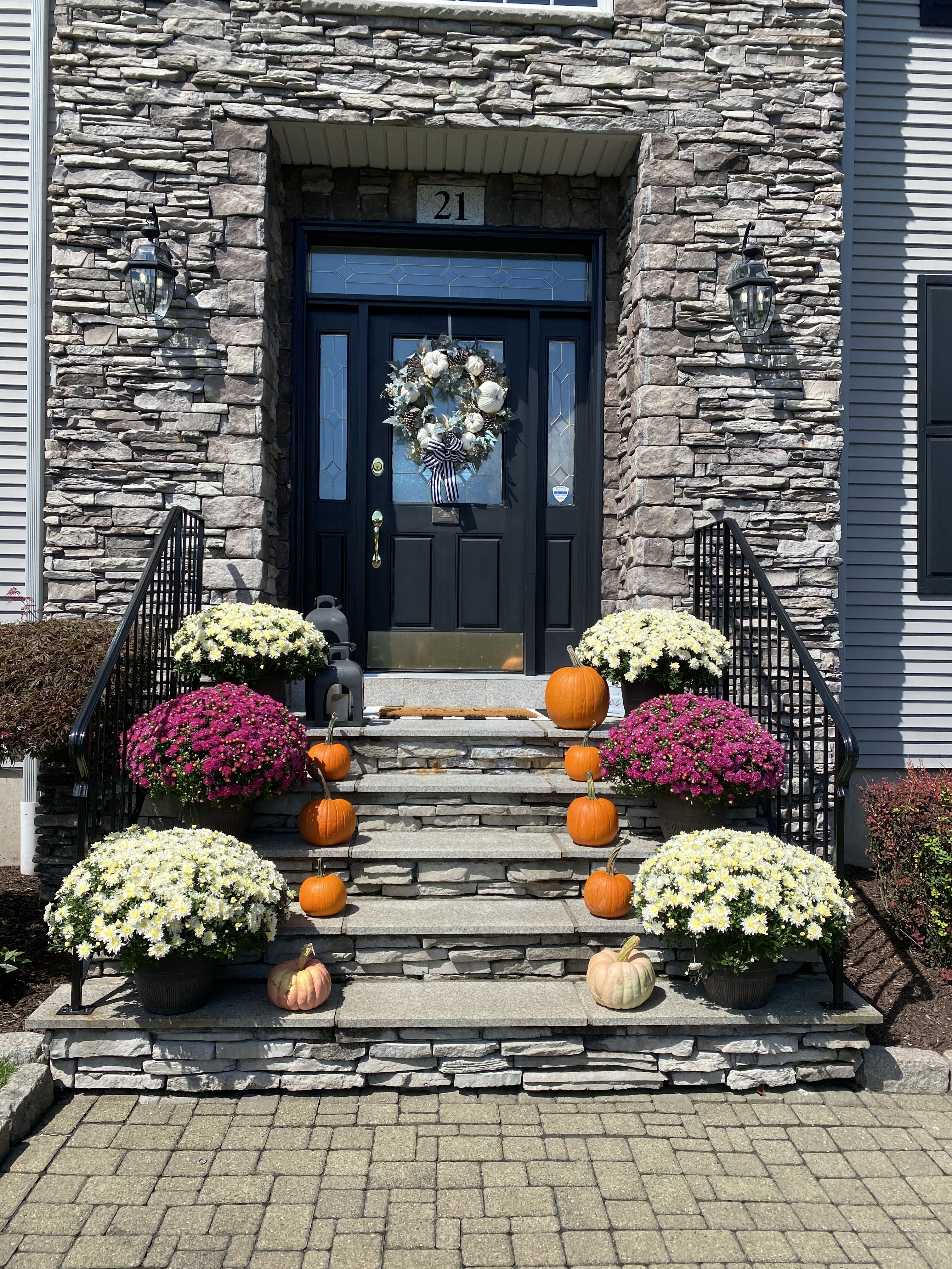 My Fall Decor on the stairs with pimpkins