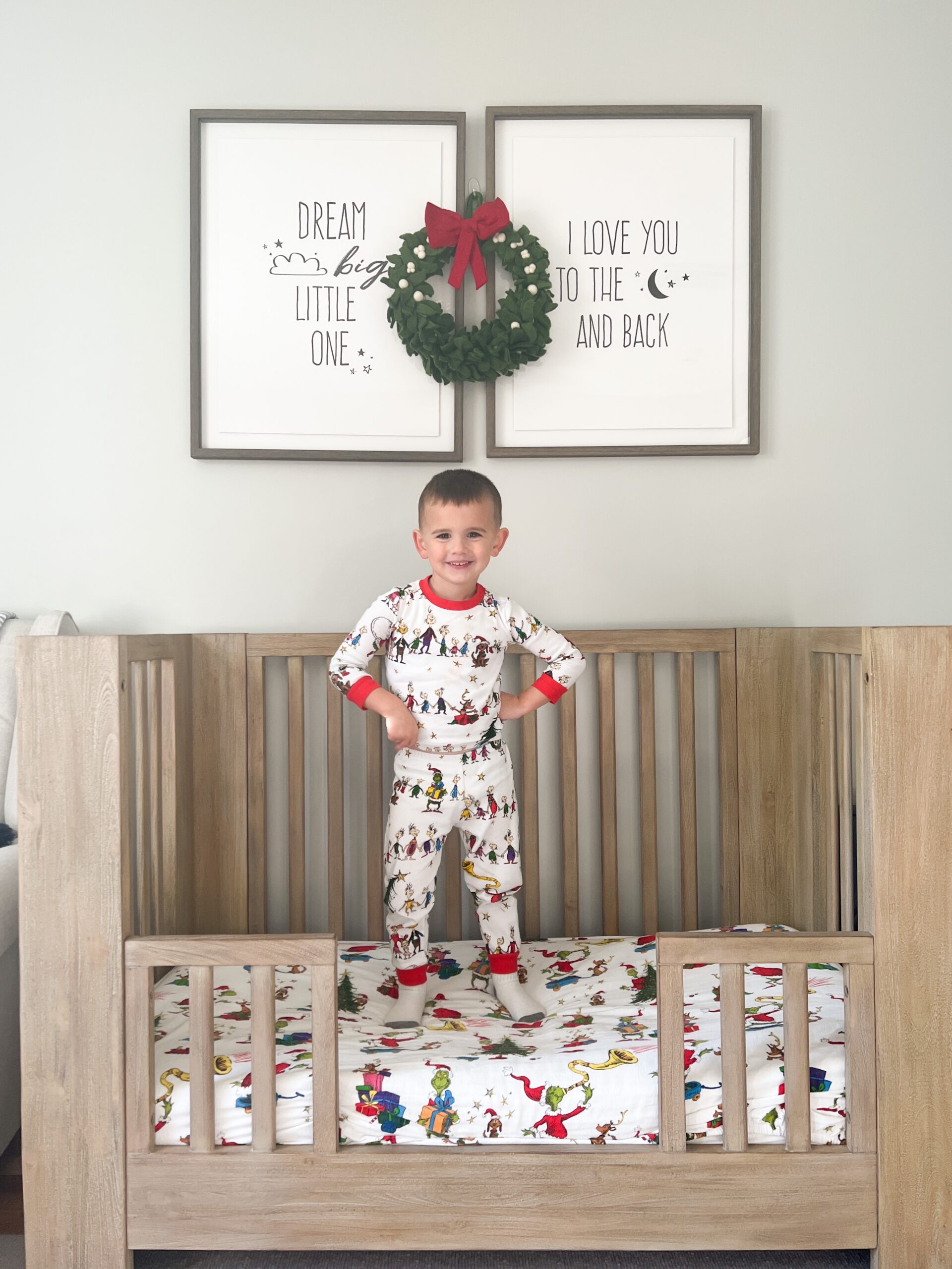 kid standing on his bed